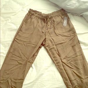 Brand new, never worn drawstring olive pants.
